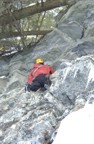 In the midst of the rock section; the crux roof is just below