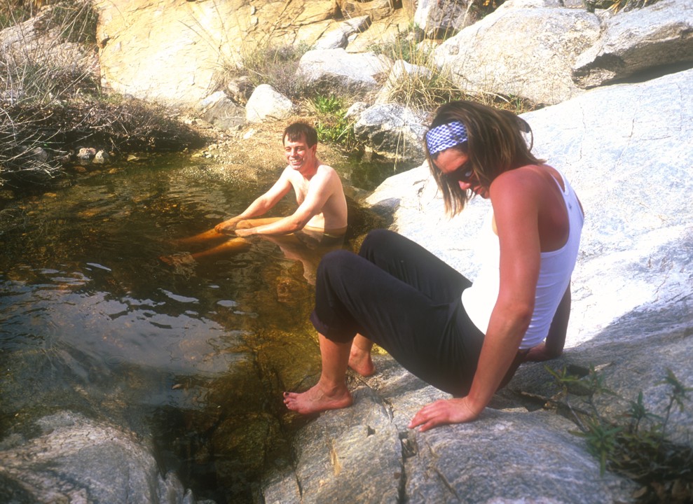 Eric takes a dip in the brook while Lori gives him "alpine curtesy"