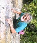 Close-up of Tom clearing the second crux on MF, pitch 1