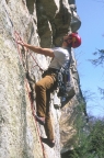 Close-up of Will gearing up for the crux moves on Wegetables