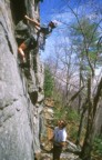 Struggling on the low roof of Interstice on the Mac Wall