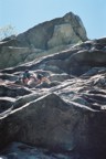 Climbing amongst severely overhanging rock on CCK Direct