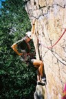 Selecting gear to place into the horizontal crack at the crux