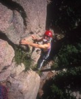 Reaching the belay on the first pitch of Deception Past