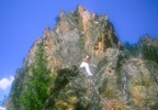 Chris at the top of the "tower" after climbing a new line -- an absolute choss pile