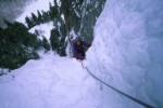 Simeon arriving at the second belay on Ames Ice Hose