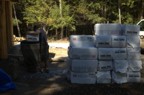 Bales of cellulose await loading into the hopper