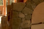 Stonework on the left side of the fireplace arch