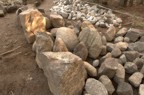 More stones gathered from the property for the chimney