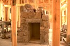 Stonework around the wood storage cubby