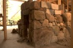 Stonework around the air intake and wood storage cubby