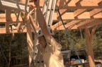 Colin pushes scaffolding onto the second floor