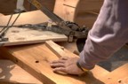 Doug cuts a dowel to length