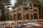 The timber frame without the rafters and ridge pole