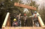 The crew prepares to receive the ridge pole