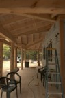 Completed front porch; the yellow wire is for a hanging lantern