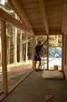 Jim standing on the back porch before the floor was installed