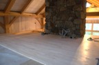 The maple flooring in the loft, partially completed