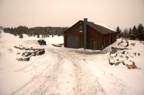 The staging area for milling operations -- the barn. Snow is removed to make way for more skidding