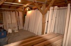 Maple board drying in the barn; drying racks are built from ropes run across the width of the barn