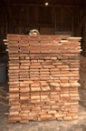 A pile of rough-sawn maple stacked in the barn during milling