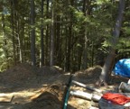 The outdoor shower is drained to the hillside using PVC pipe left over from the septic installation