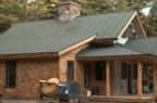 The roof is finally installed -- 24 guage standing seam, double lock, Hartford green
