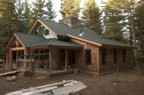 The new roof from the northwest with cutouts for the kitchen exhaust, boiler, and septic vent