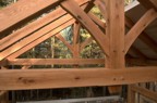 The timber frame of the roof system