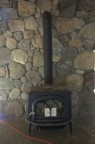 The wood stove and pipe, just after installation
