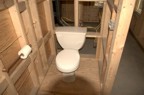 A temporary toilet is installed for the crew