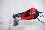 Tommy follows the undercling pitch with a full pack of gear, no less