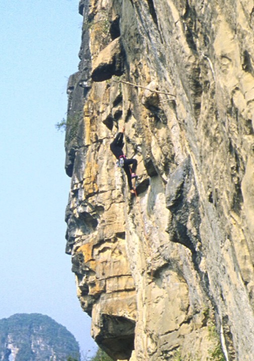 Close-up of Jim high up on an unnamed Skinner route (5.11d)