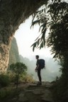 Jim standing beneath the arch on Moon Hill