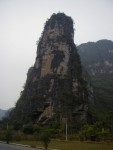 Thumb Peak with some Chinese climbers establishing a new line (they are barely visible)